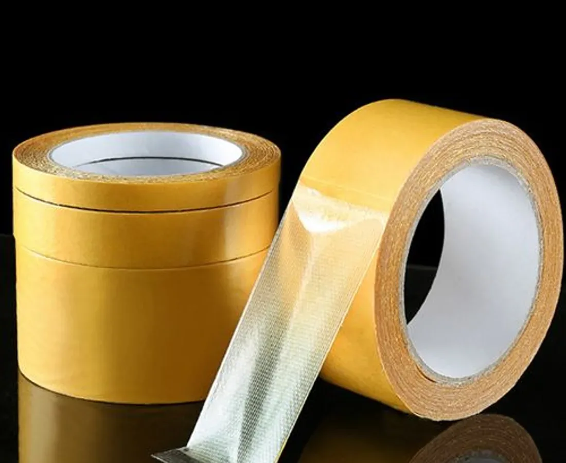 ScrimTack ST-300 double-sided cloth tape roll with cloth-yarn carrier detail